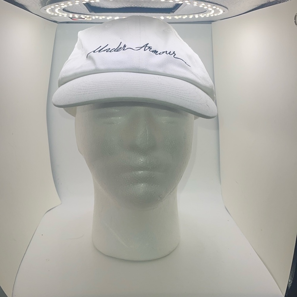 Under Armour ladies Free Fit White Adjustable Cap. One size fits all.